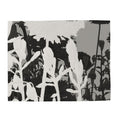Black and white abstract pattern on a textured surface