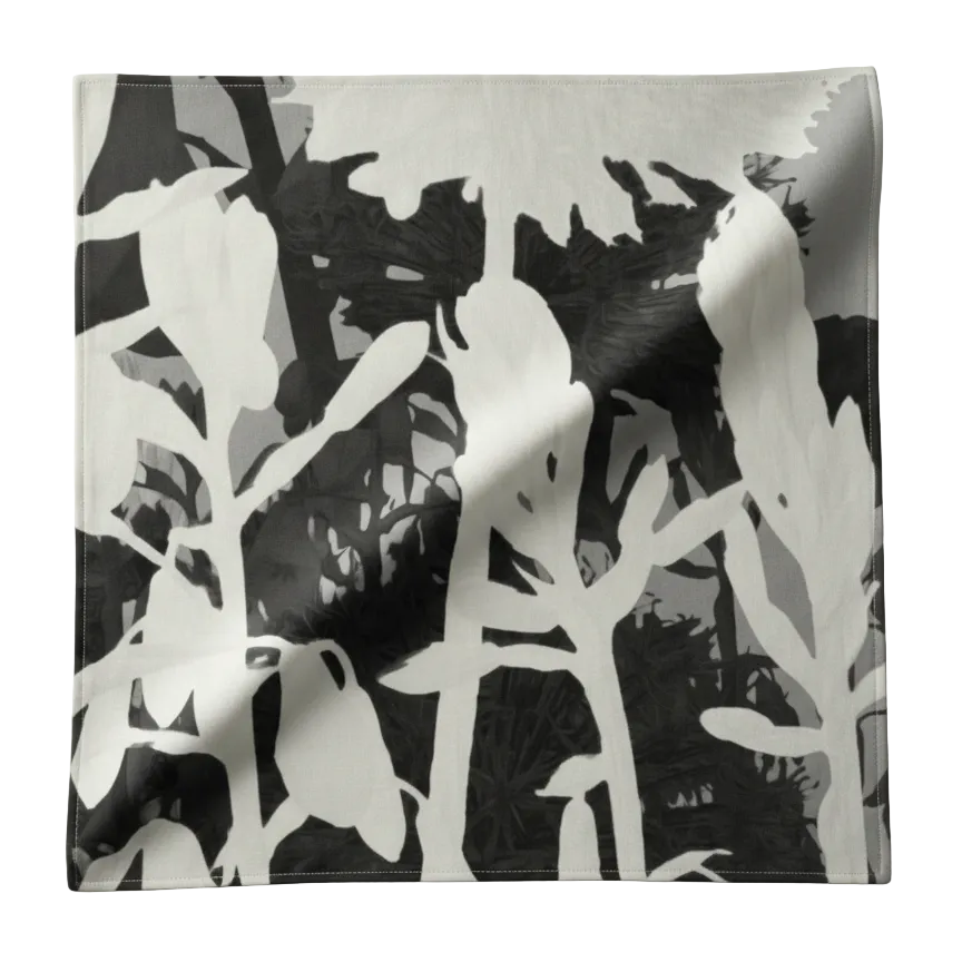 Black and white patterned fabric on a light gray background