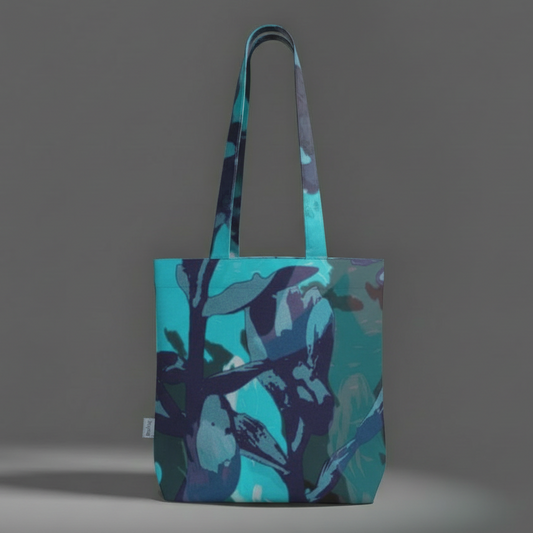 Tote bag with a blue and purple abstract design on a gray background
